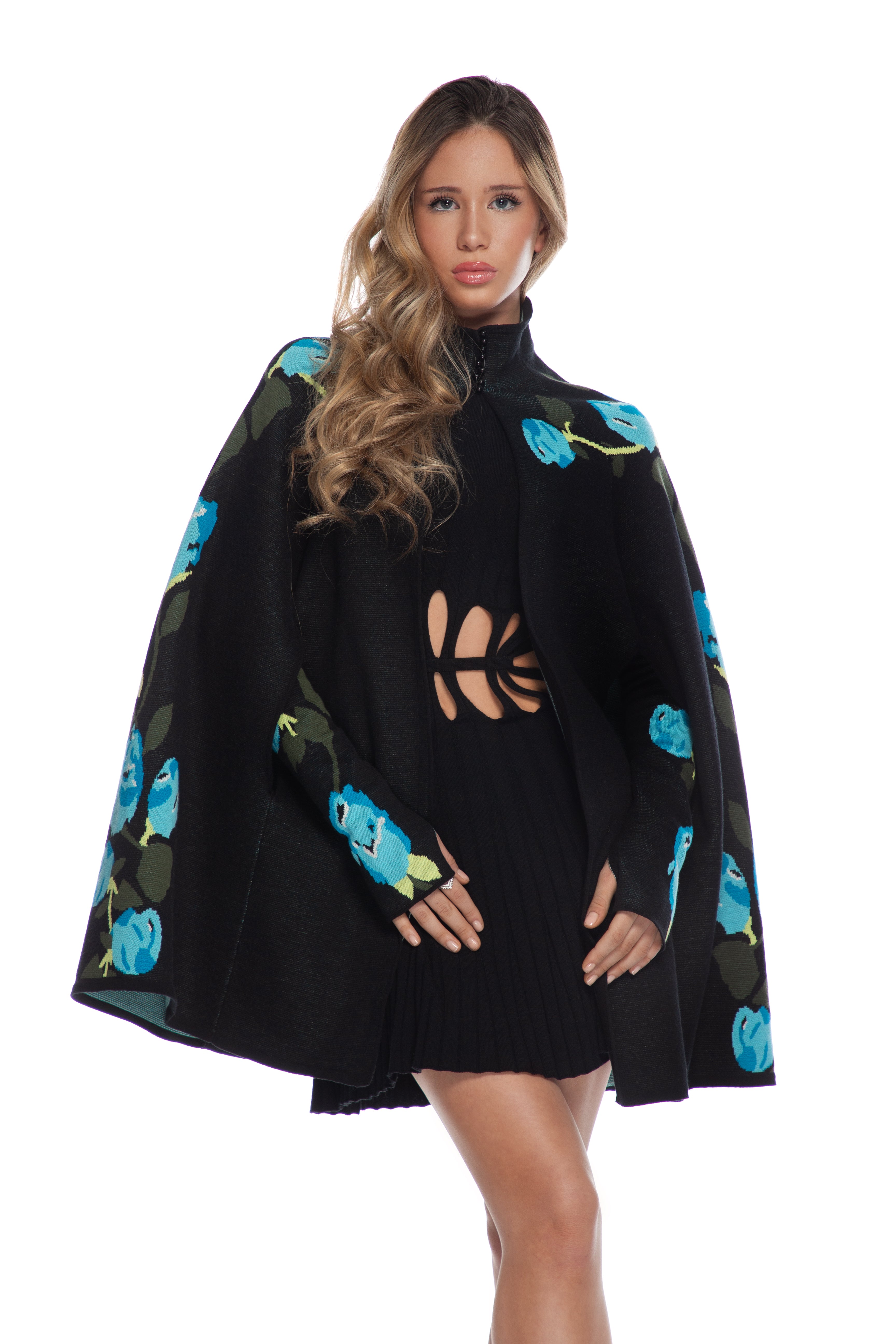 Long cape with "stylized roses" motifs