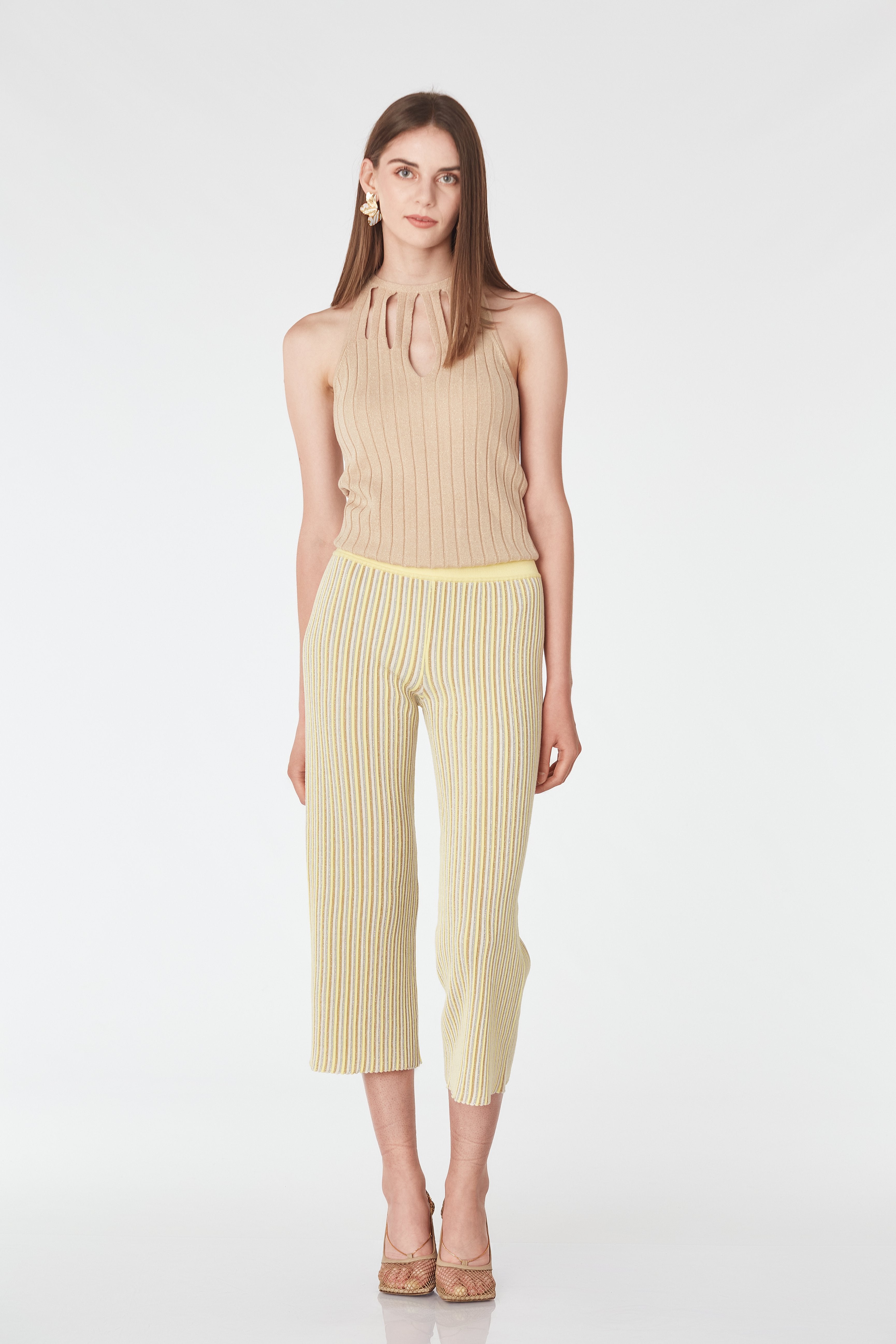 Pantaloni trei sferturi