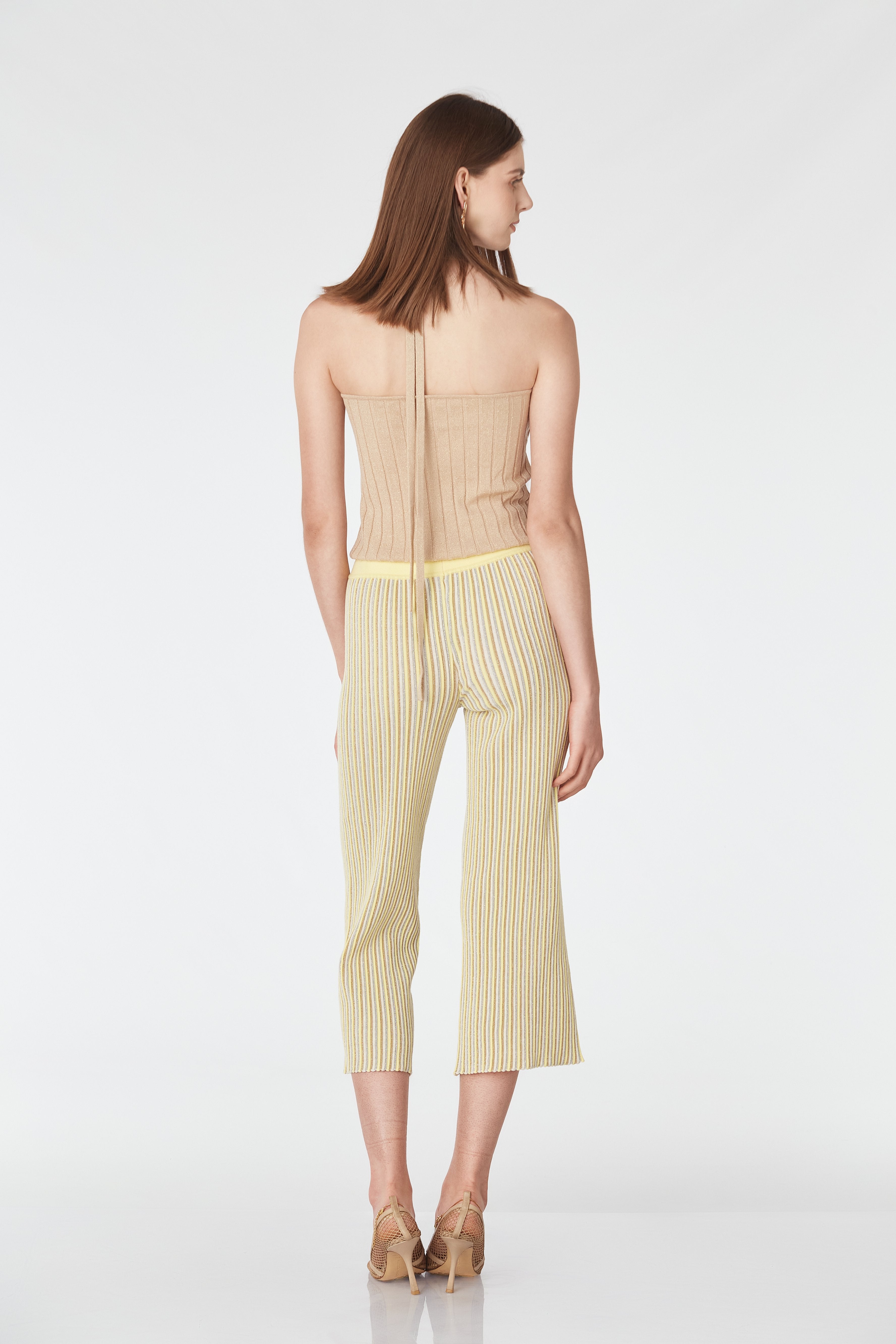 Pantaloni trei sferturi