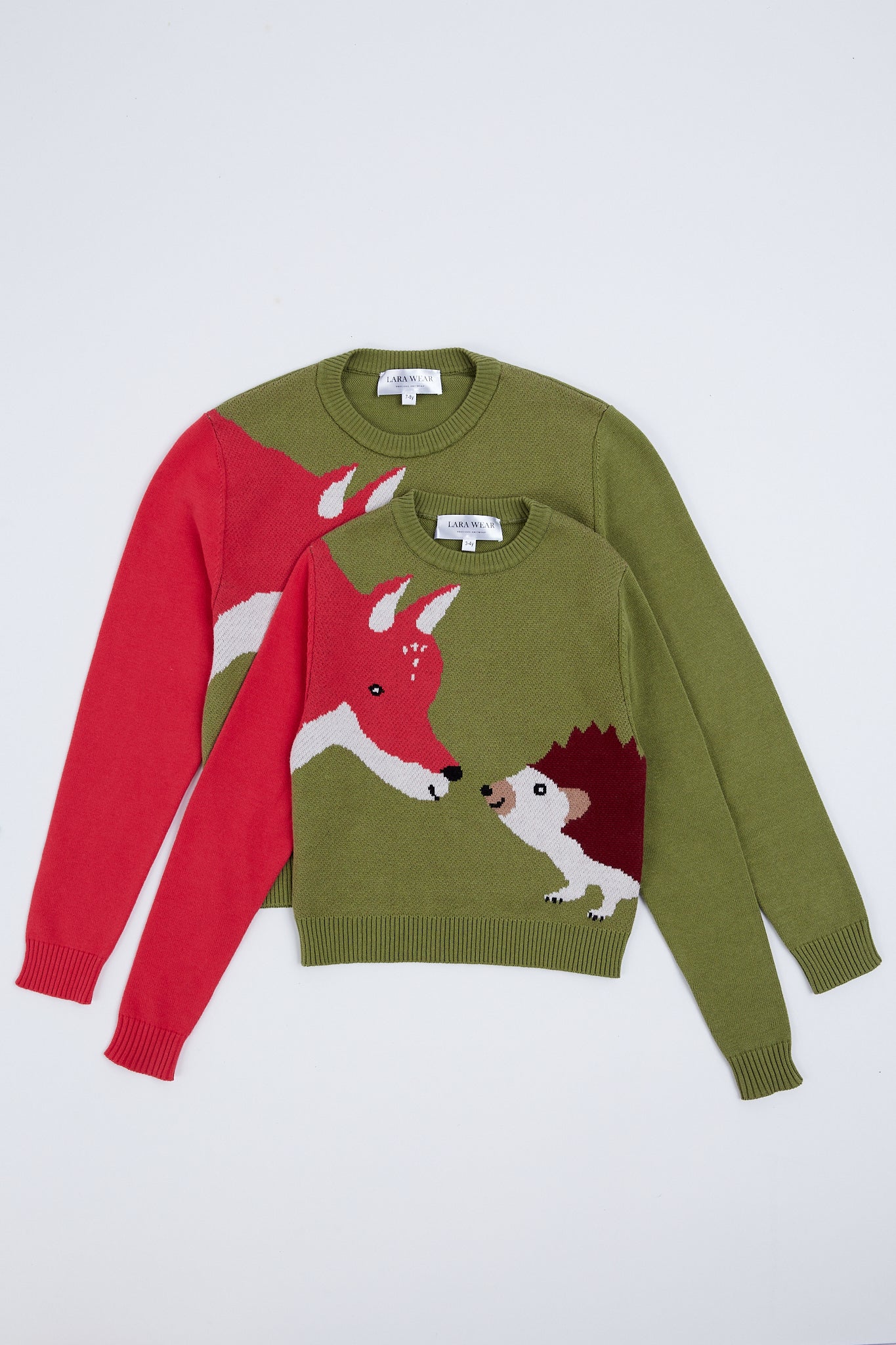 Playful children's sweater with fox and hedgehog